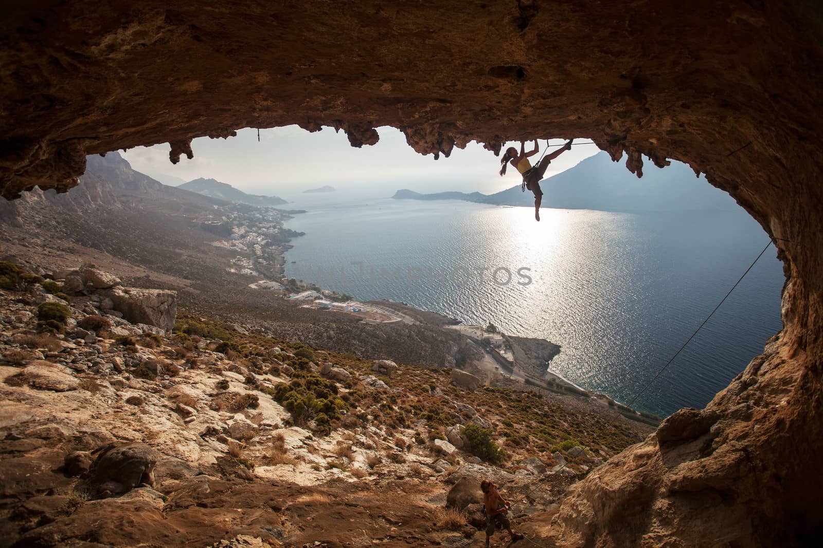 Family rock climber at sunset. Kalymnos, Greece. by photobac