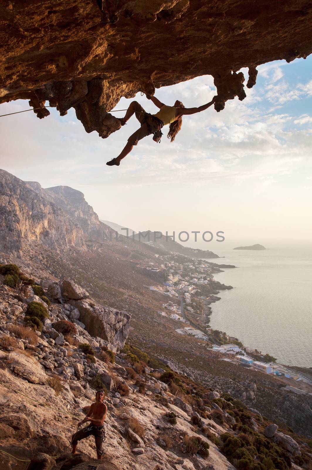Rock climber at sunset, Kalymnos, Greece by photobac