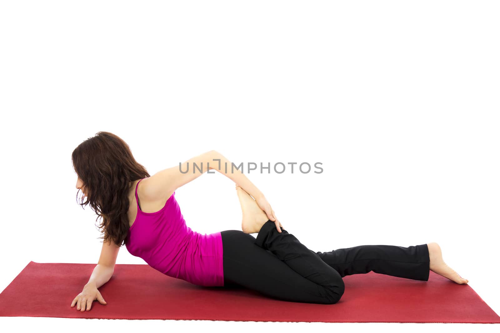 Young woman doing half frog pose in yoga (Series with the same model available)