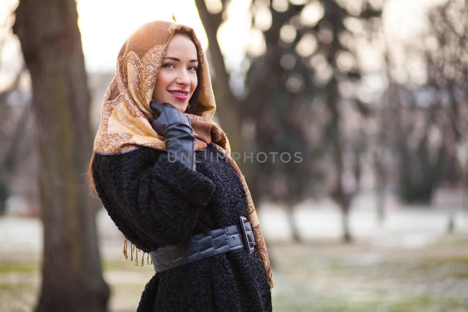 Smiling young and happy business woman wearing headscarf