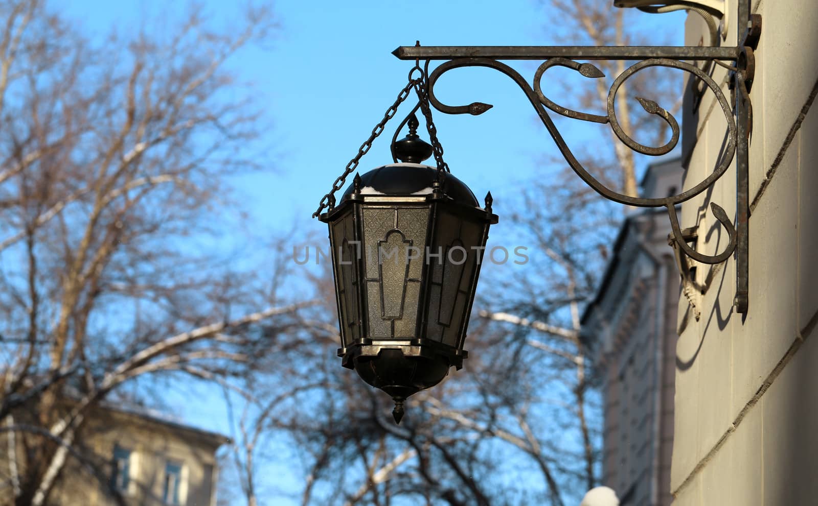 Ancient lantern on the wall