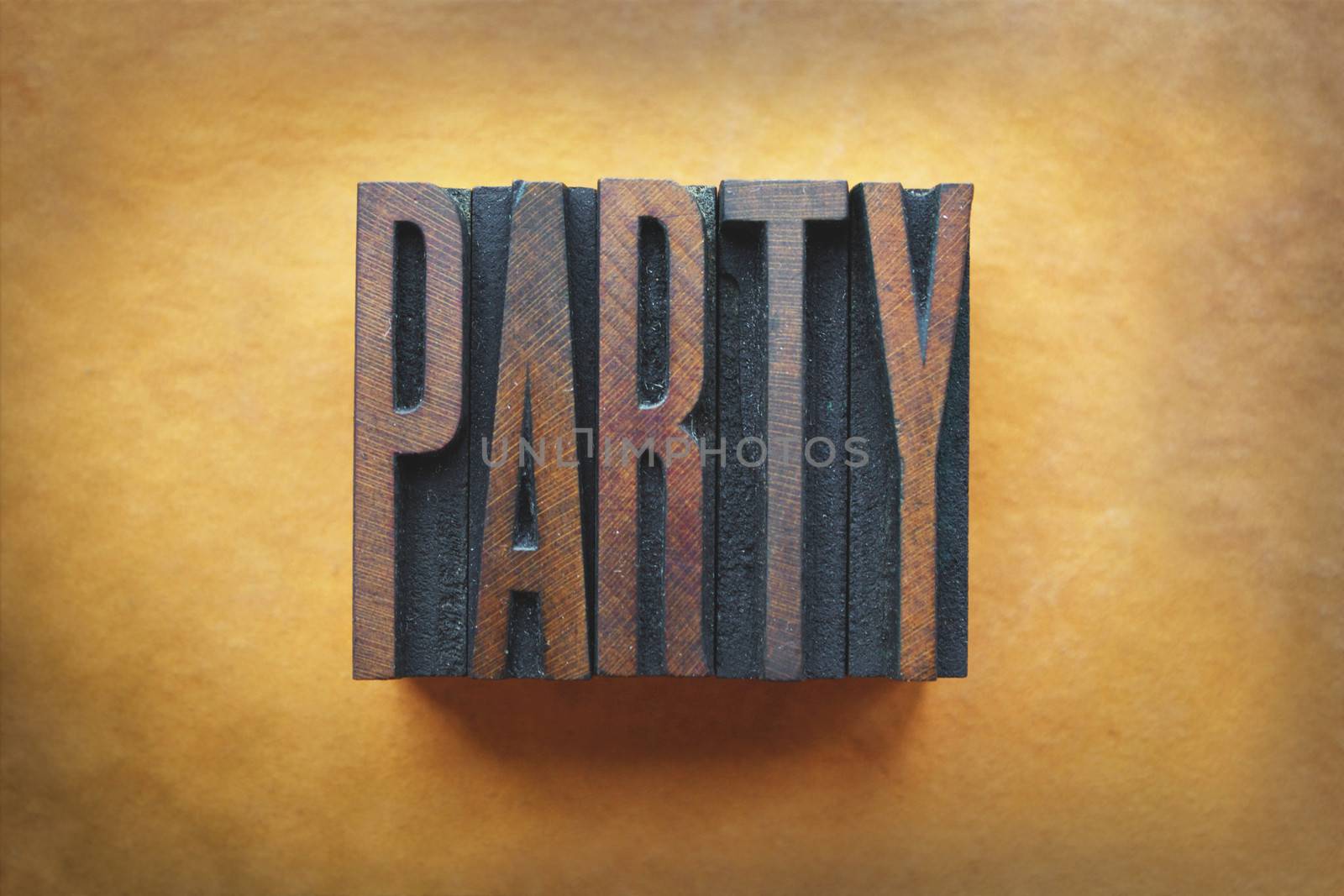The word PARTY written in vintage letterpress type.