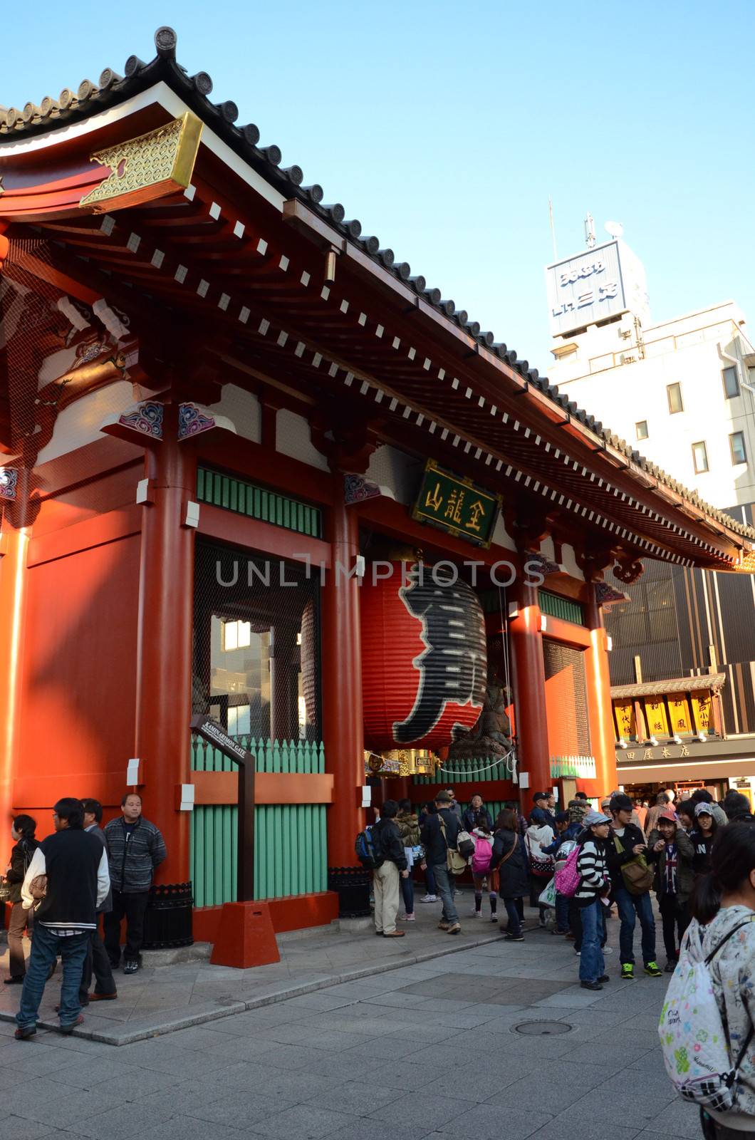 ASAKUSA, JAPAN- NOV 21, 2013: Sensoji temple is very popular temple. The temple is approached via the Nakamise, shopping street, providing tourist souvenirs. Tokyo, Japan. November 21 2013 