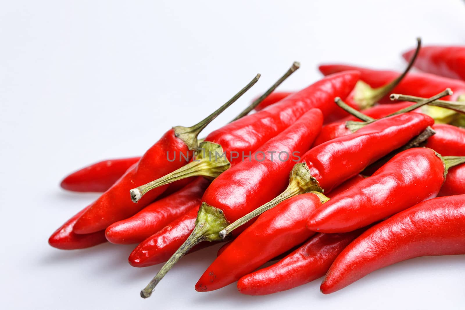 Group raw red chili peppers closeup shot