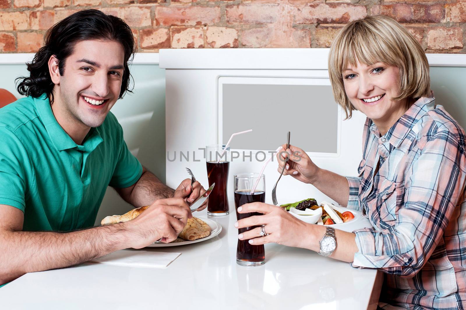 Young couple having dinner at a restaurant