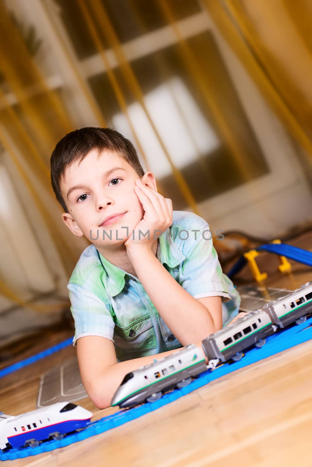 Portrait of a boy with toy train