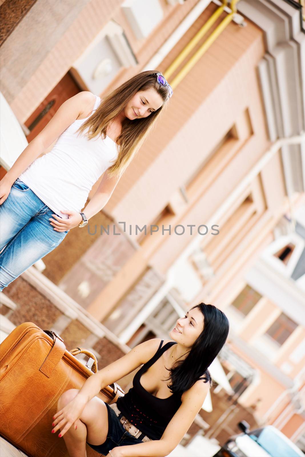 Two girlfriends traveling angled by Nanisimova