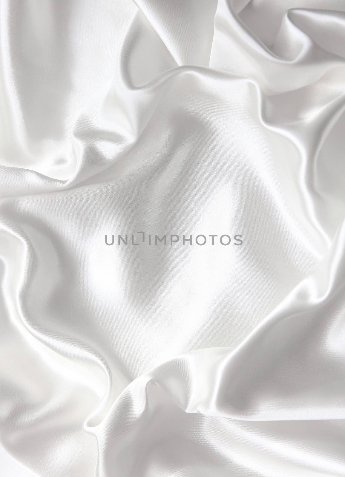 Smooth elegant white silk can use as wedding background 