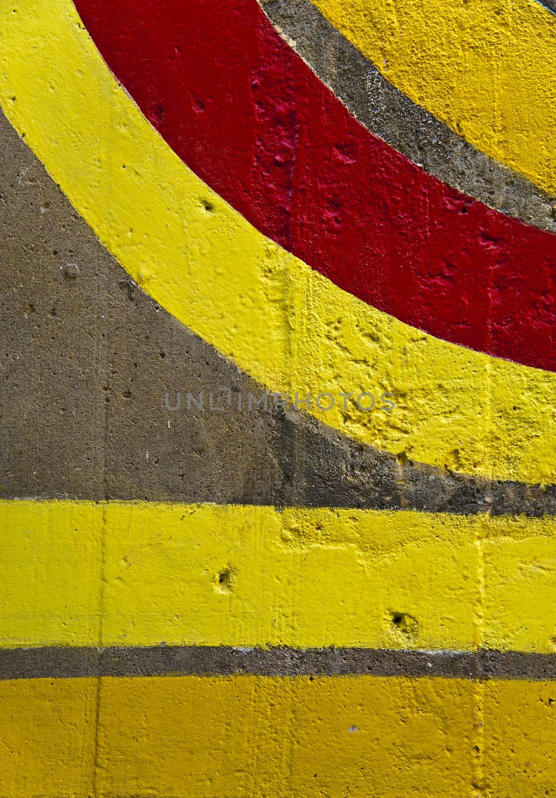 Grunge yellow and red lines on a wall