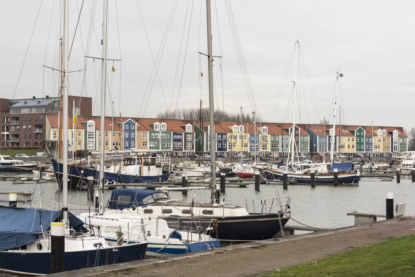 The dutch place Hellevoetsluis with boats in the harbour