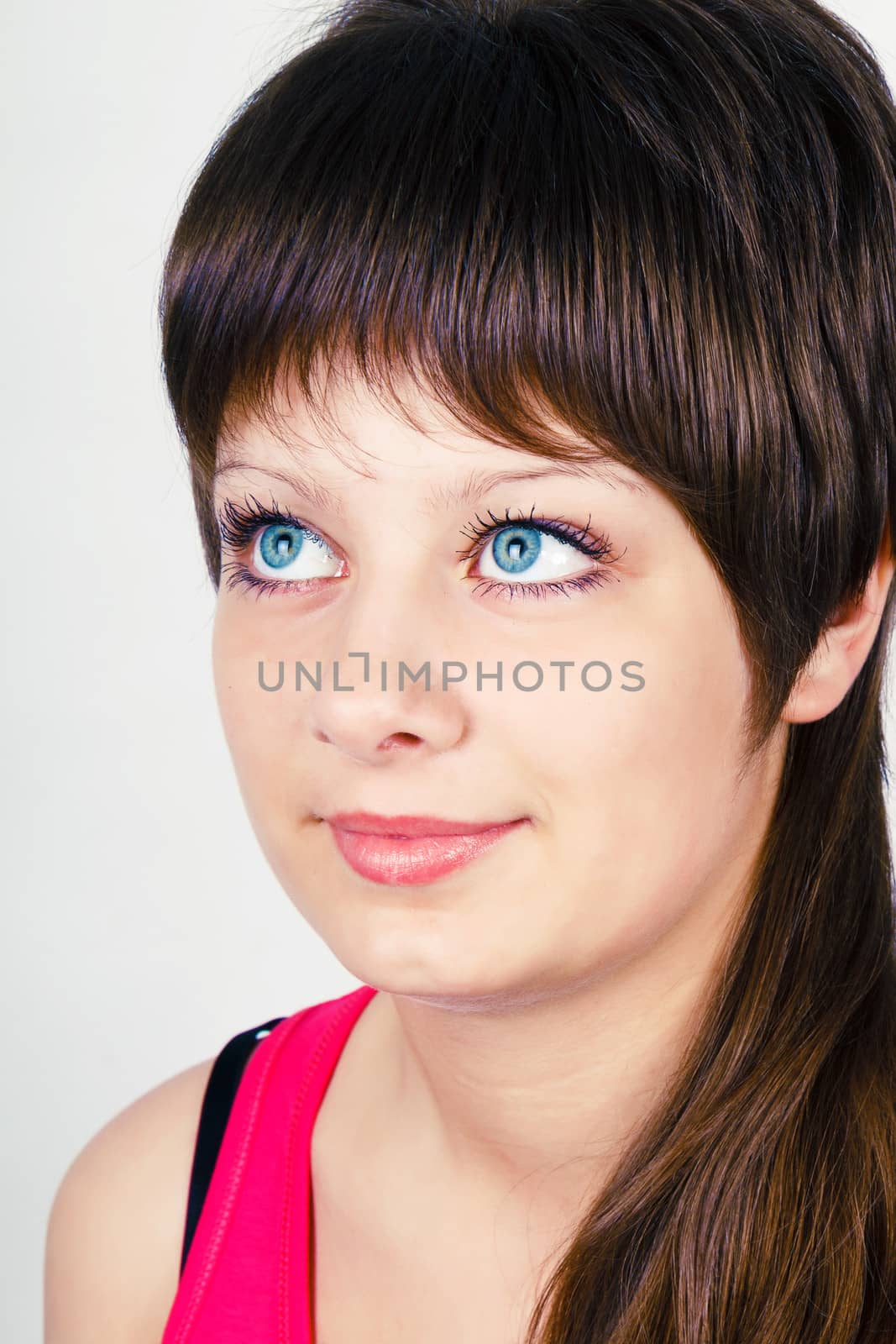 Portrait of an attractive young blue-eyed girl