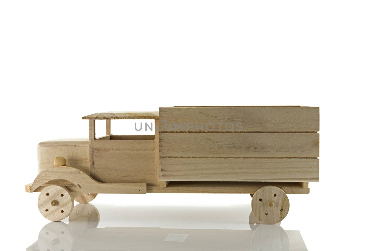 wooden handmade transporter car isolated on white background
