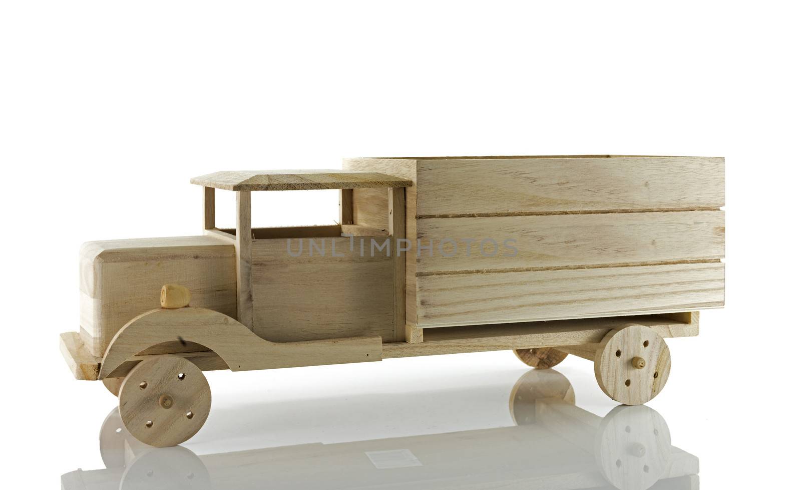 wooden handmade transporter car isolated on white