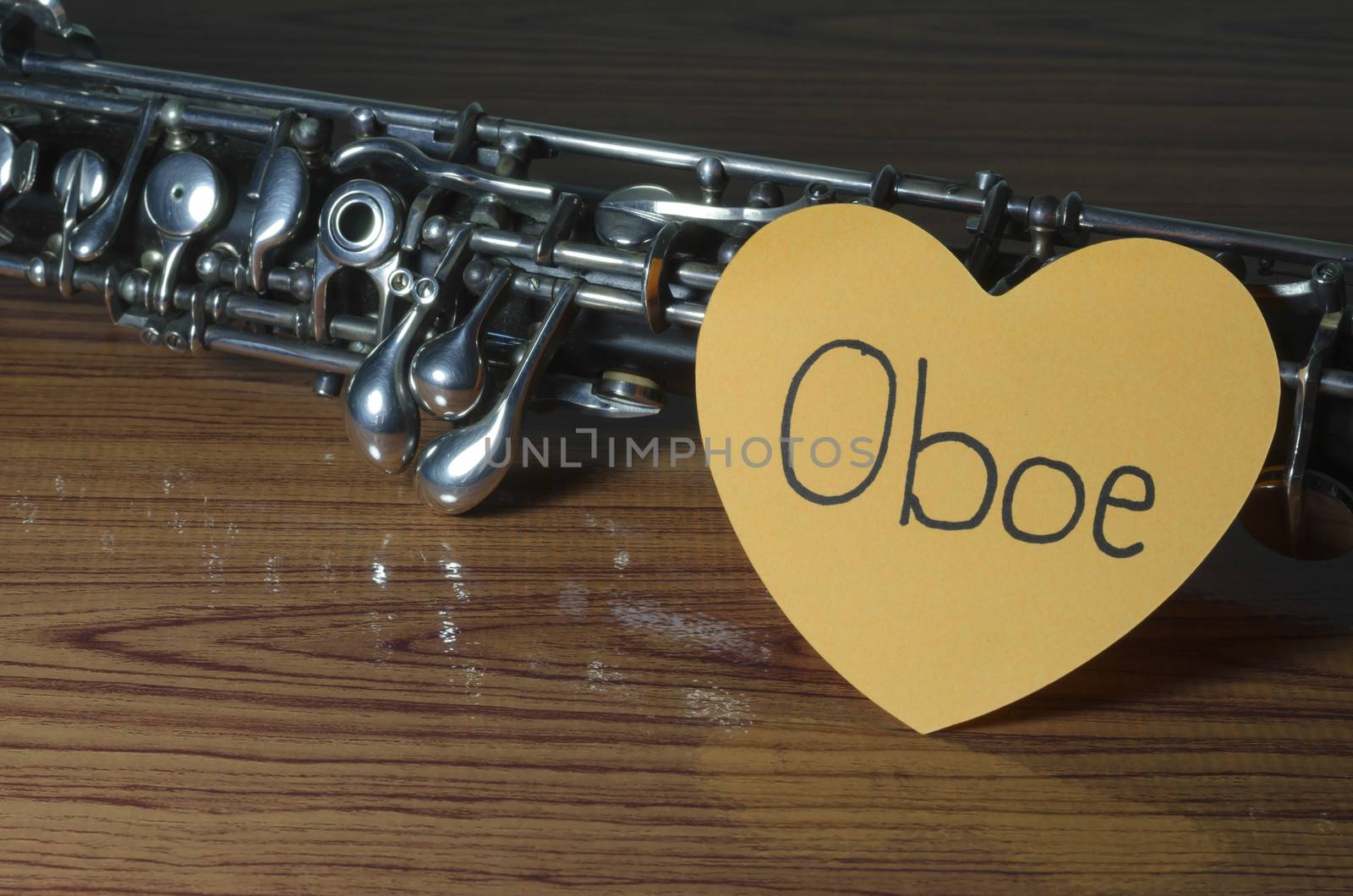 oboe with heart n wood background