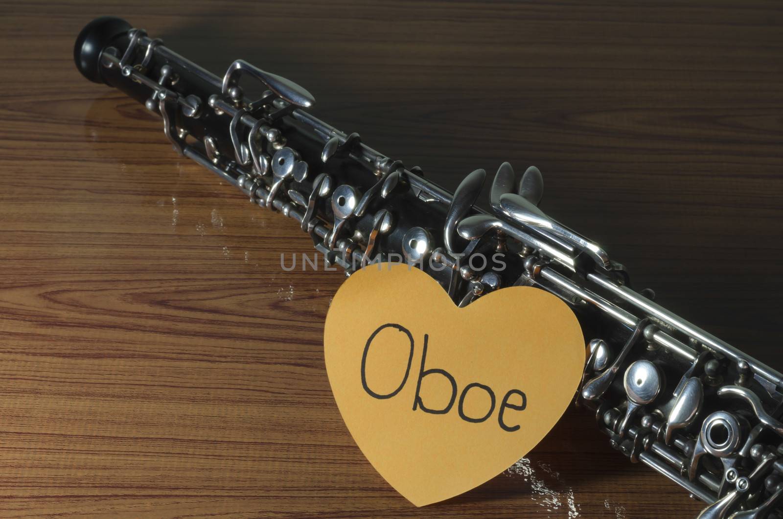 oboe with heart n wood background