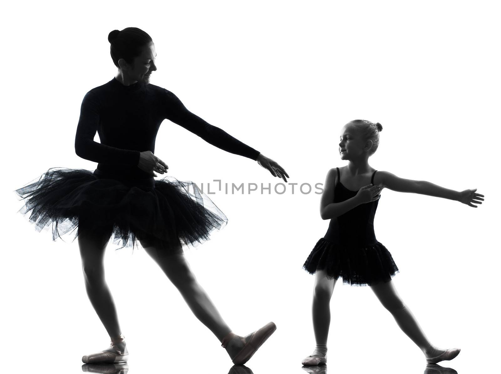 woman and little girl  ballerina ballet dancer dancing in silhouette on white background