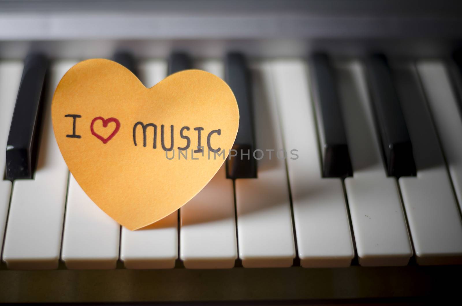 heart on key piano say love music