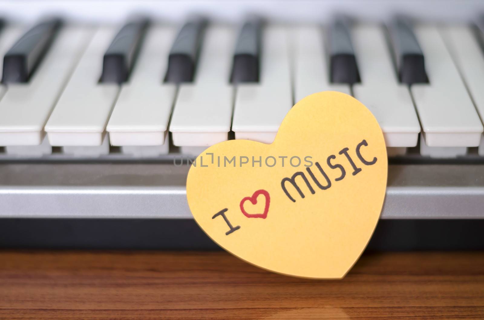 heart on key piano say love music