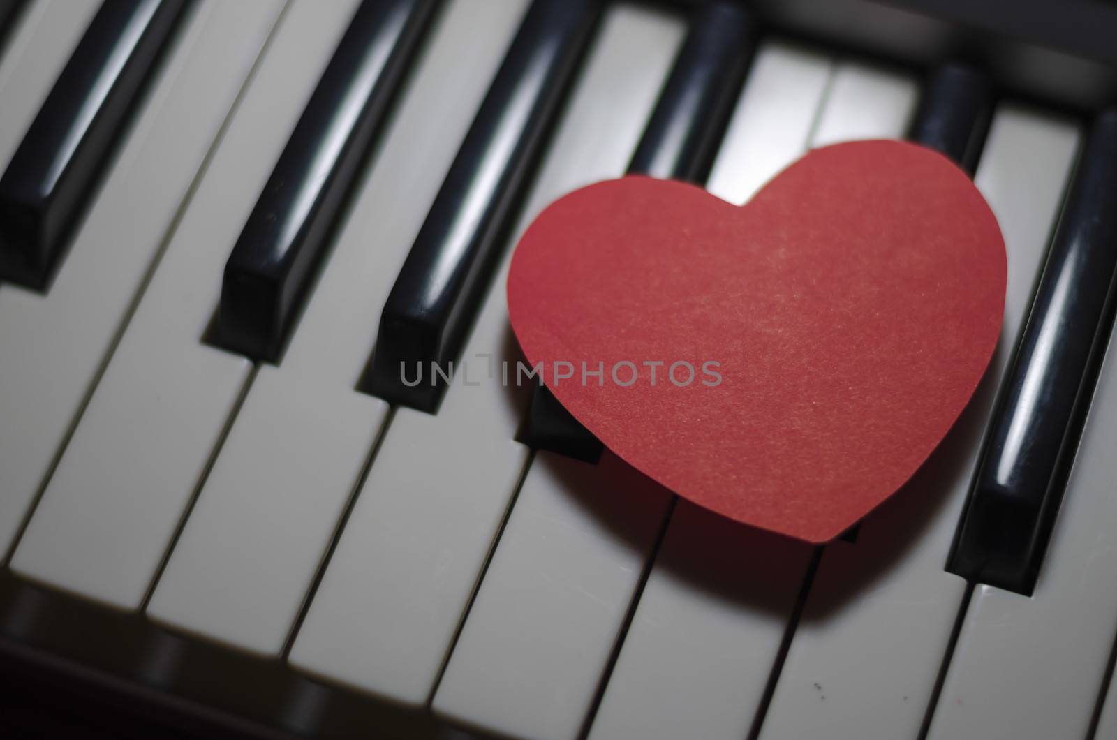 heart on key piano say love music