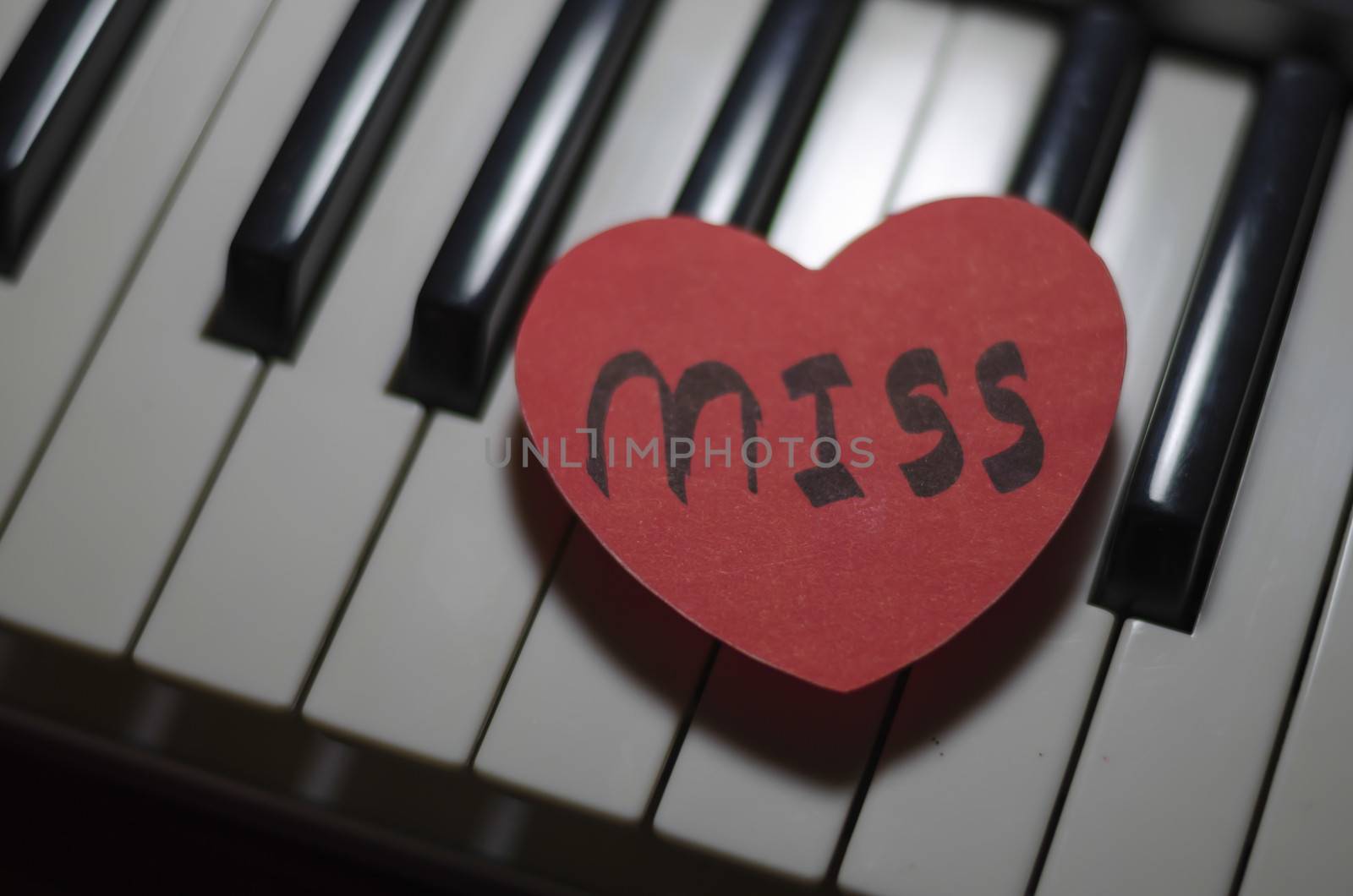 heart on key piano say love music