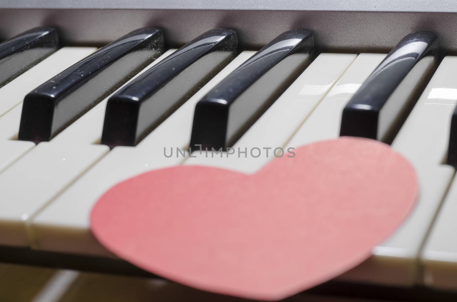 heart on key piano say love music
