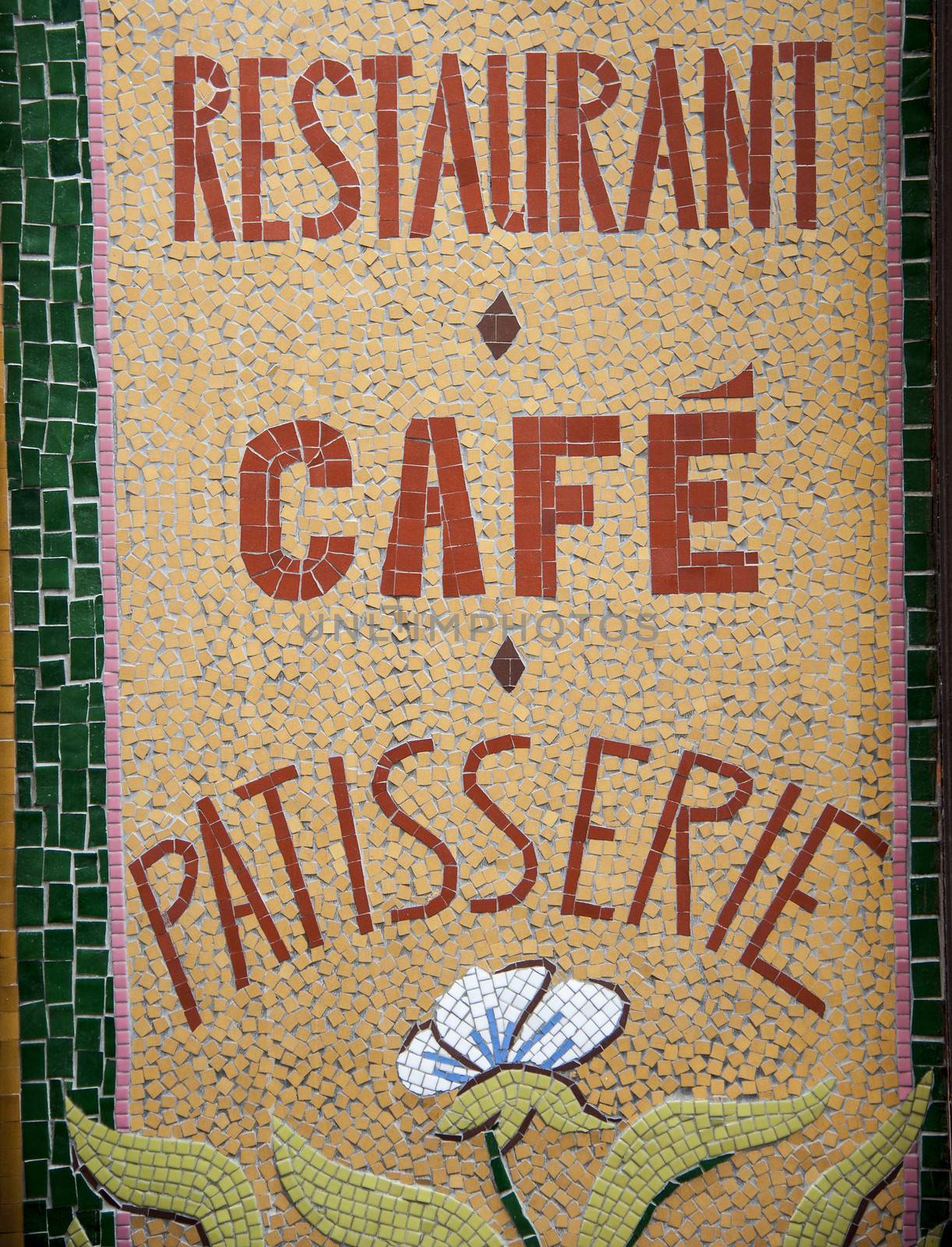 Acolored mosaic made by many pieces of a restaurant