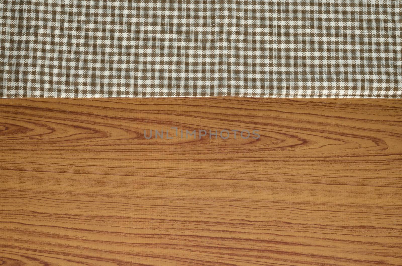 brown kitchen towel pattern on wood background