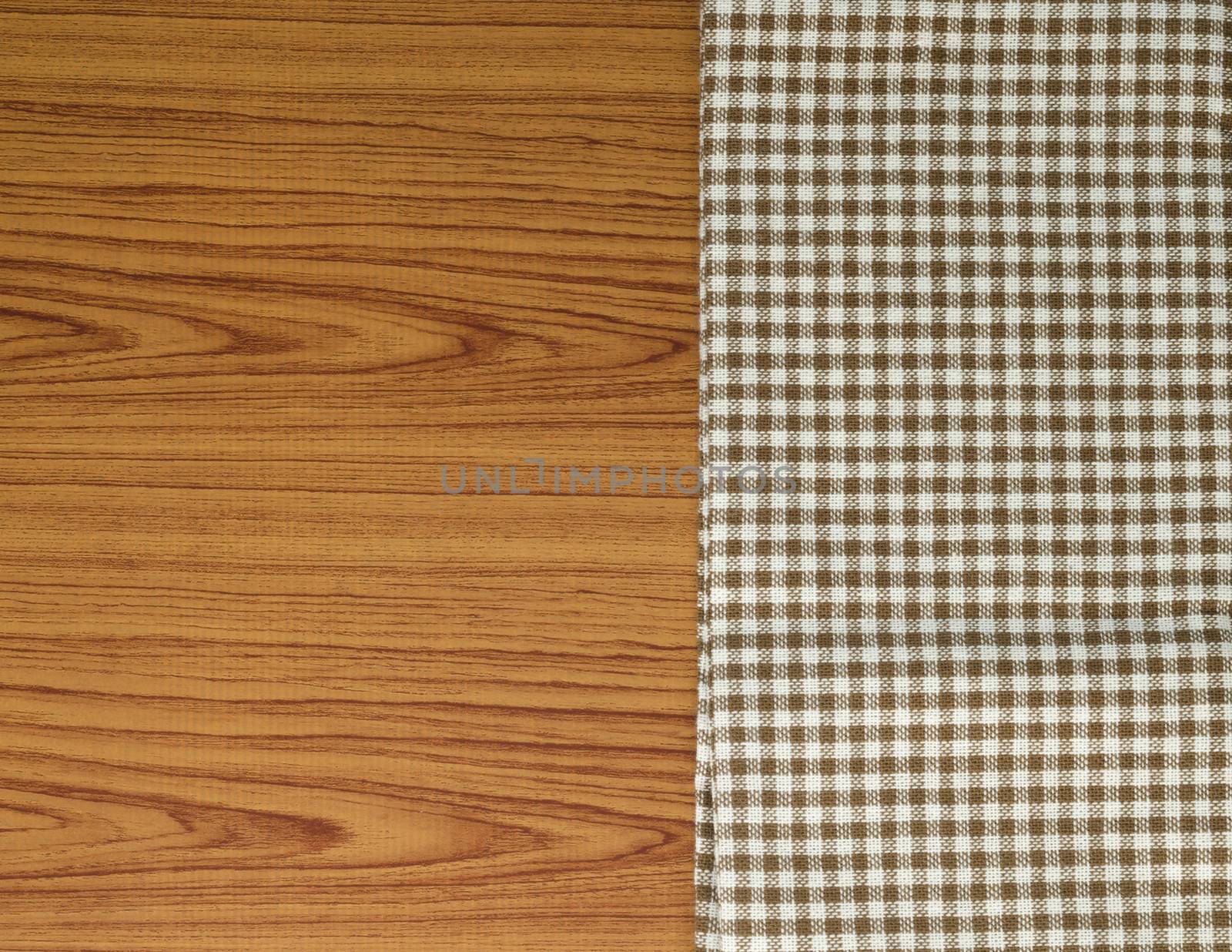 brown kitchen towel pattern on wood background