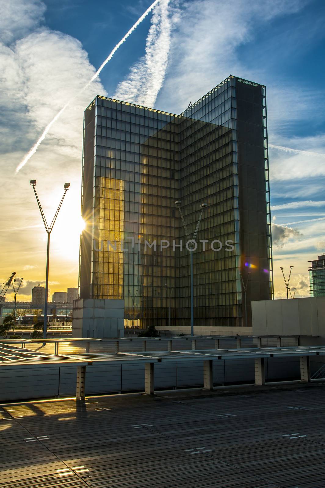 glasses skyscraper in Paris in front of a nice sunset