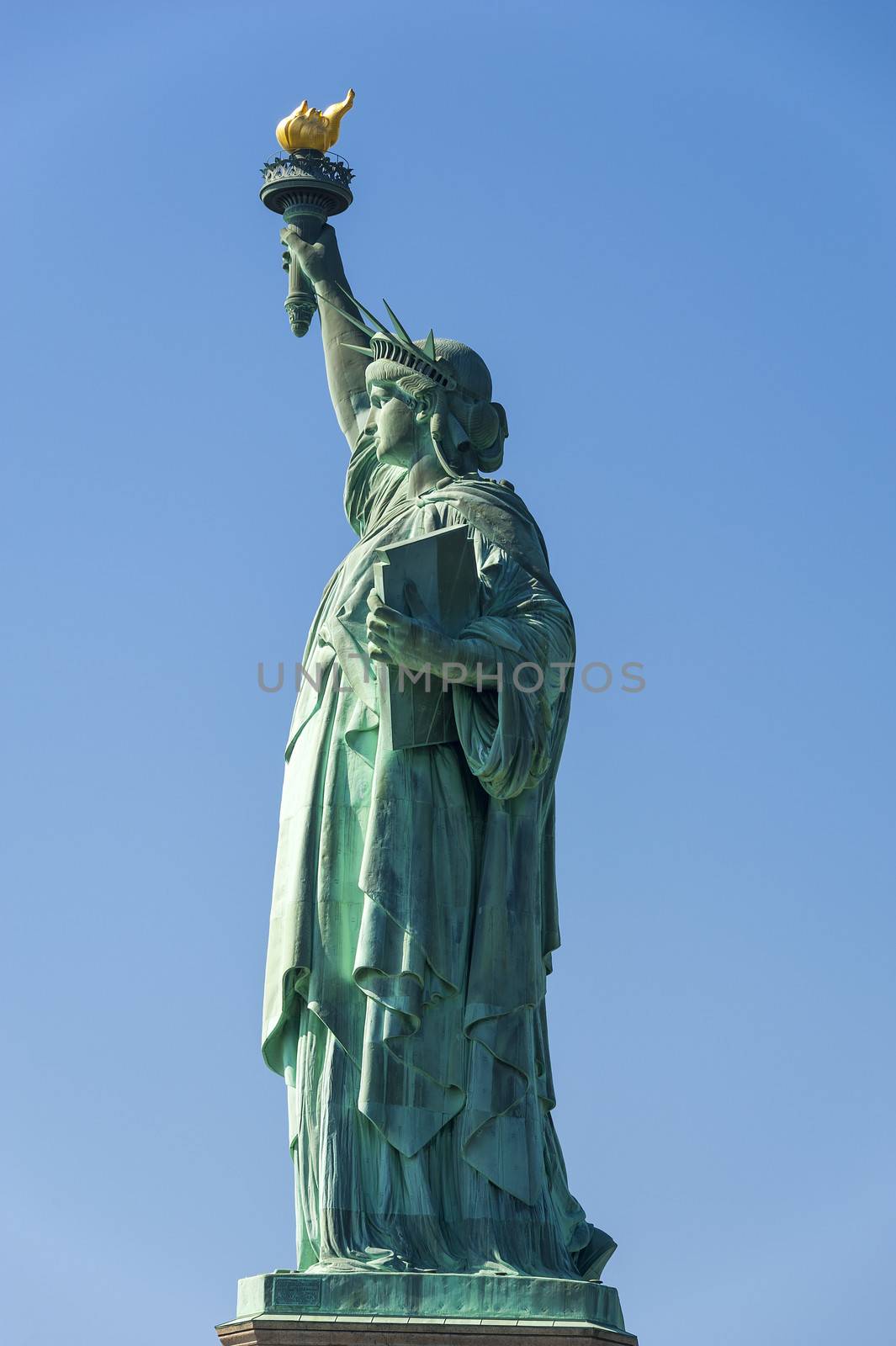 Statue of Liberty on Hudson River in NYC