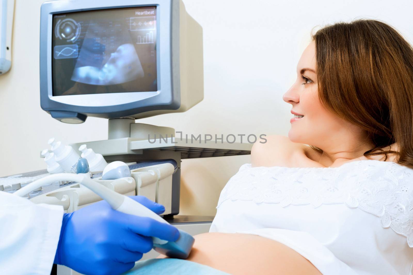 pregnant woman on reception at the doctor by adam121