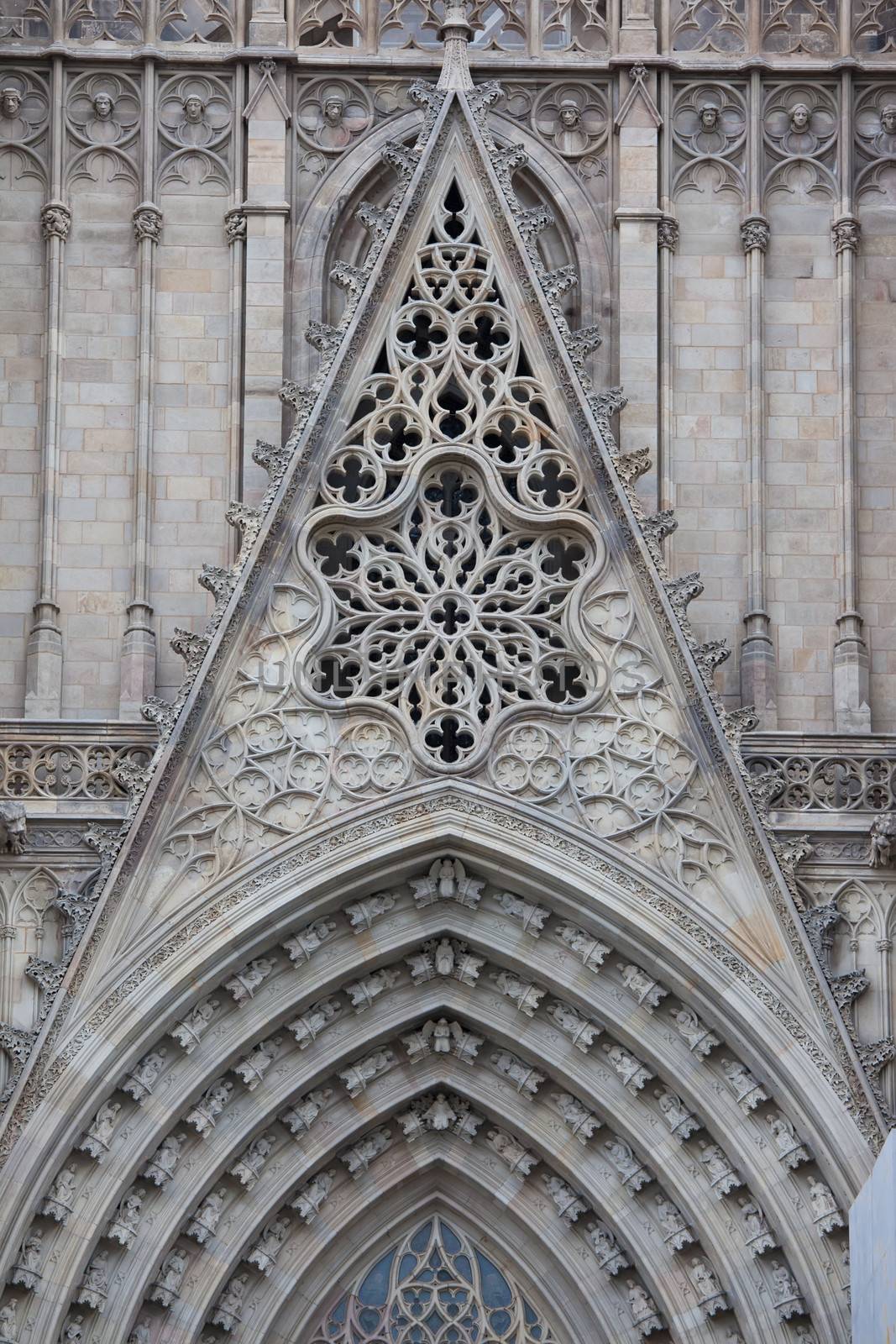 Facade details of famous Gothic Catholic Cathedral, Barcelona, Spain