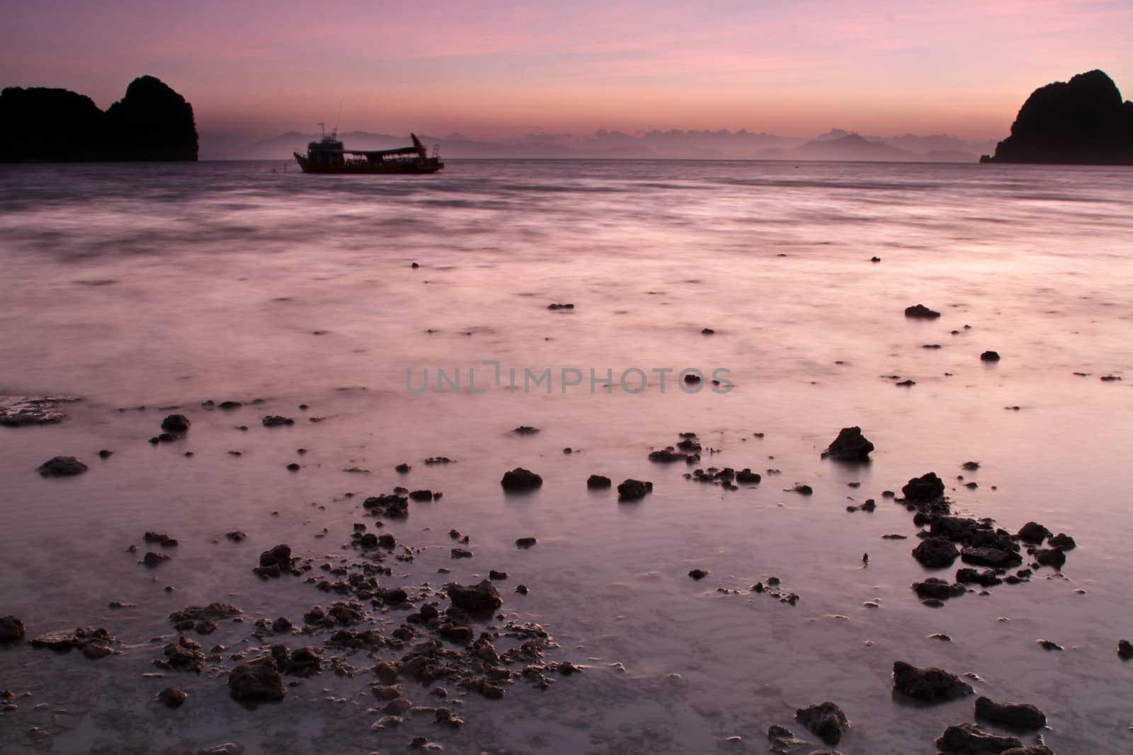 Sunset silhouettes at the beach of the Koh Ngai island Thailand