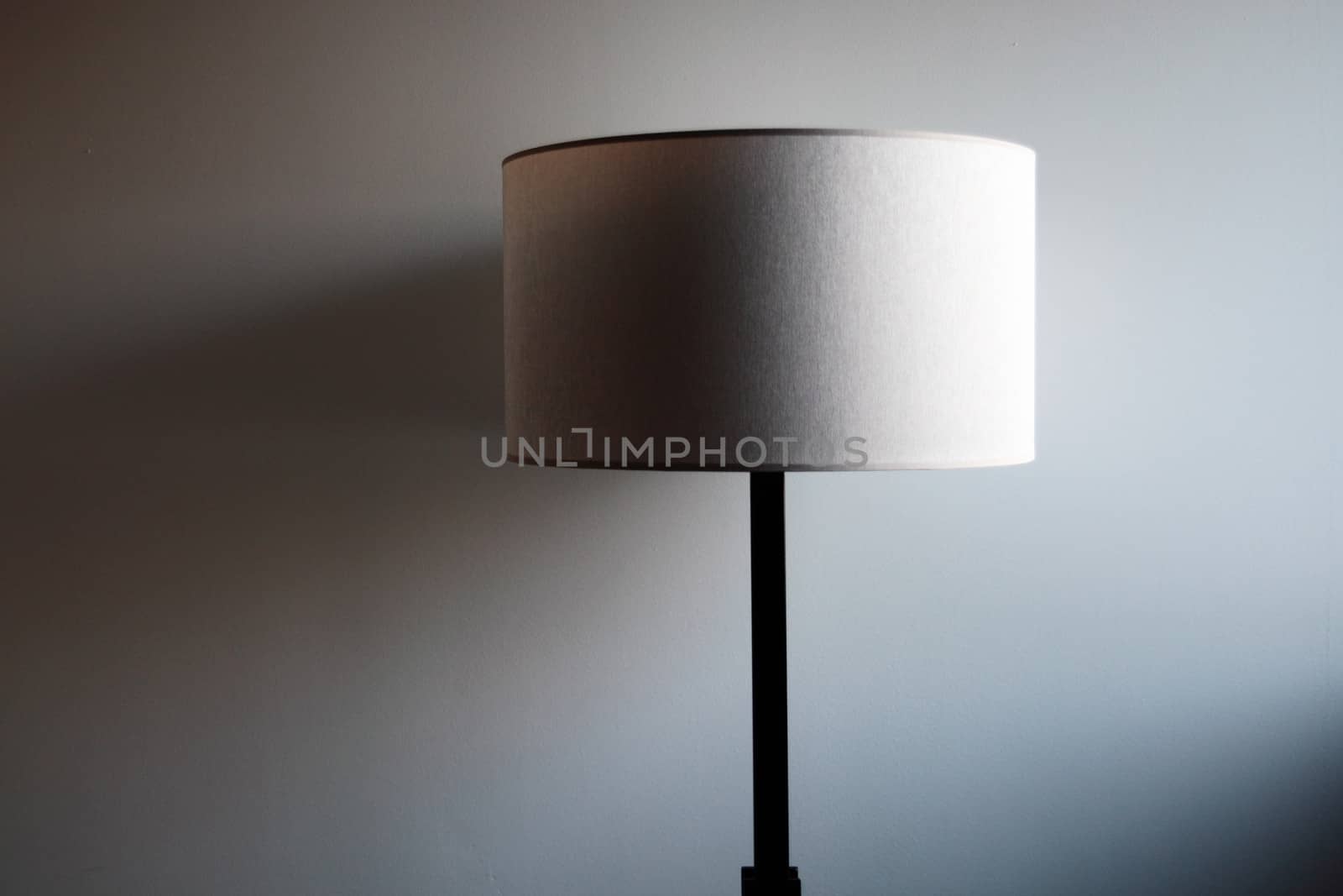 a modern lamp on a white wall