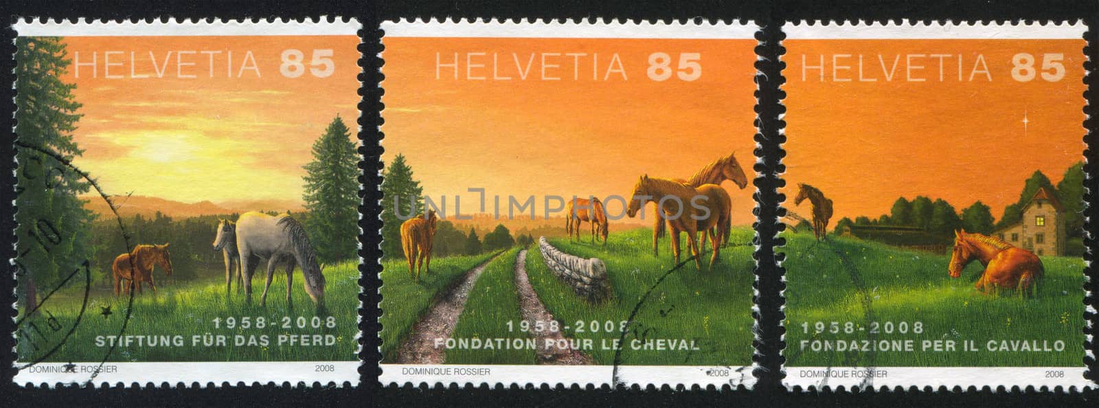 SWITZERLAND - CIRCA 2008: stamp printed by Switzerland, shows Horses and sun, circa 2008