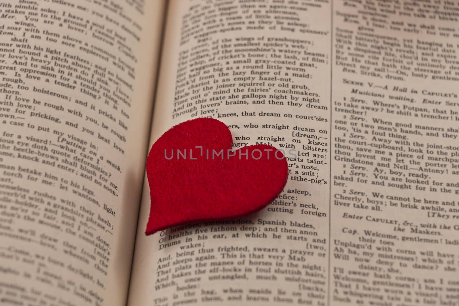 Big red heart on a book page by snowwhite