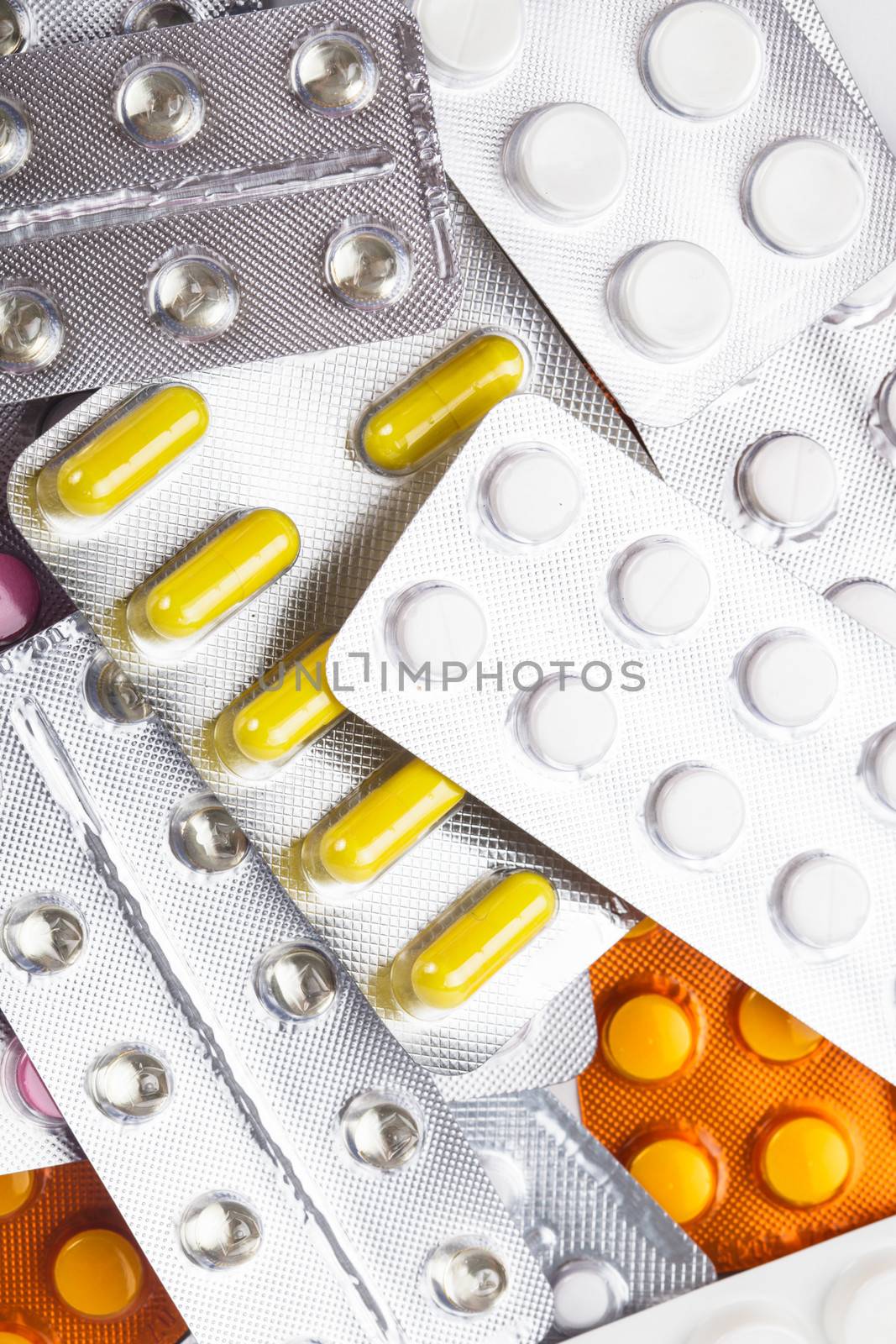 The variety of tablets in packs on background, treatment