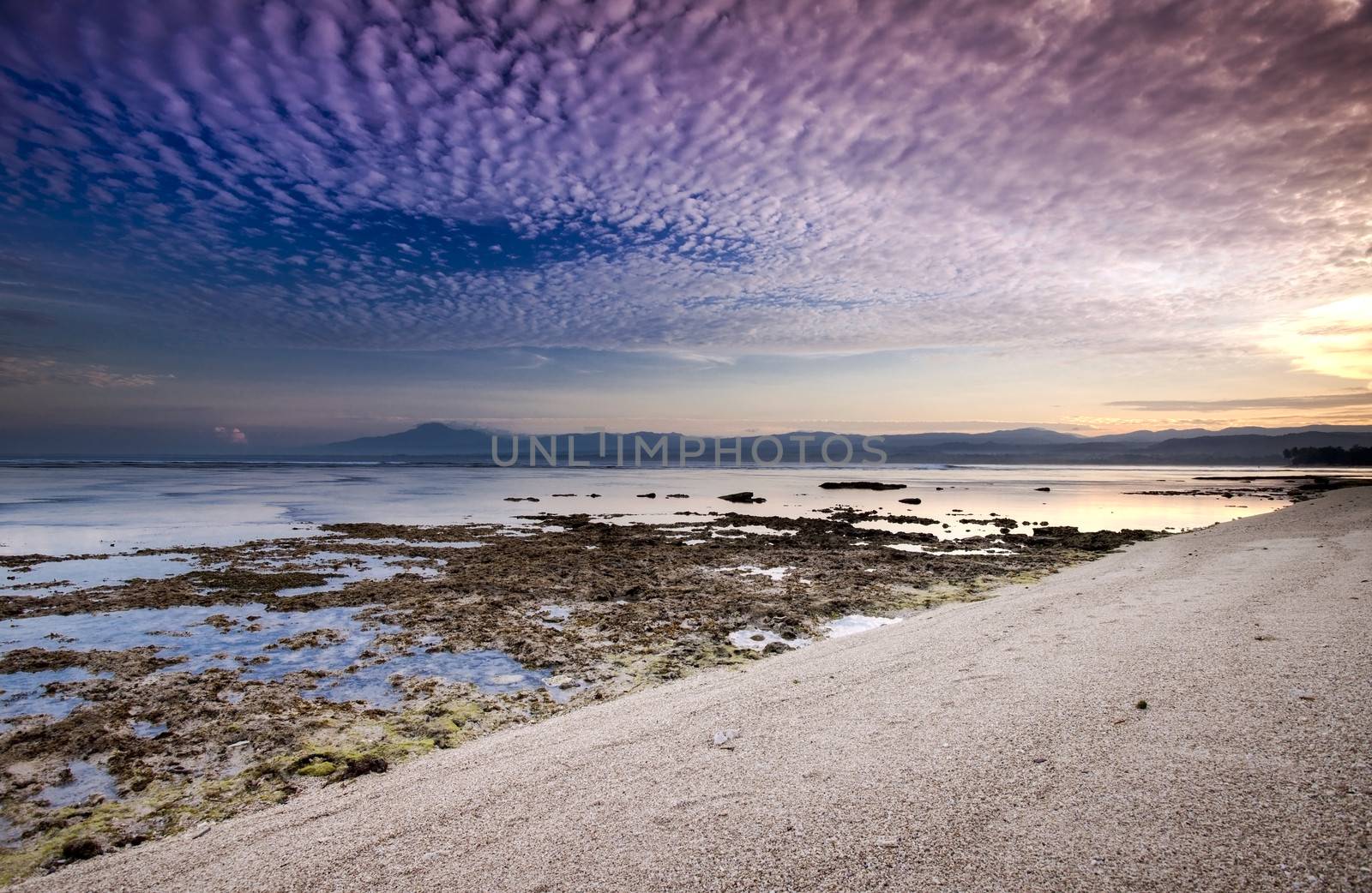 Beautiful landscape picture from a beach in Indon��sia at sunset