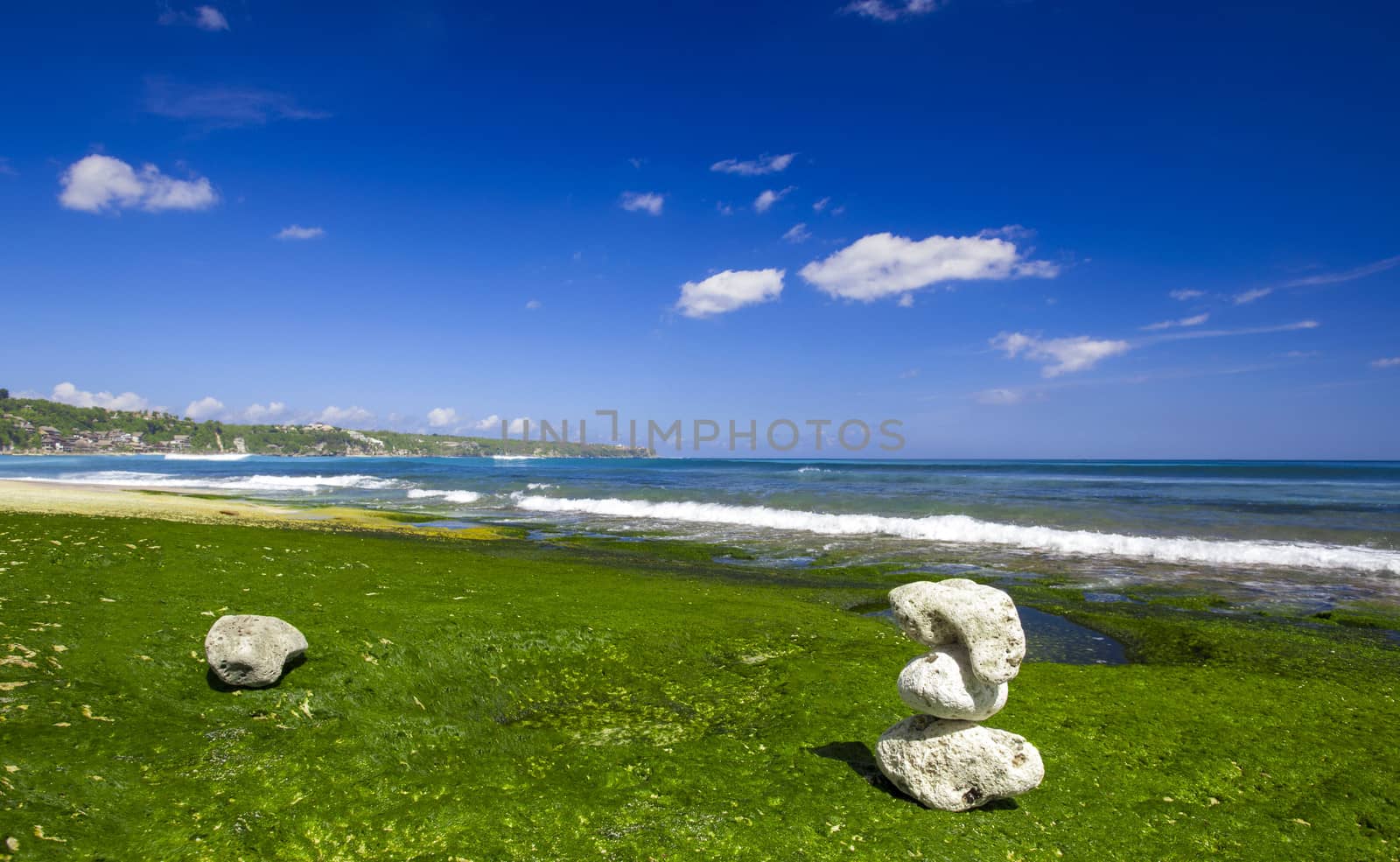 Beautiful tropical beach with white stones on the rocks
