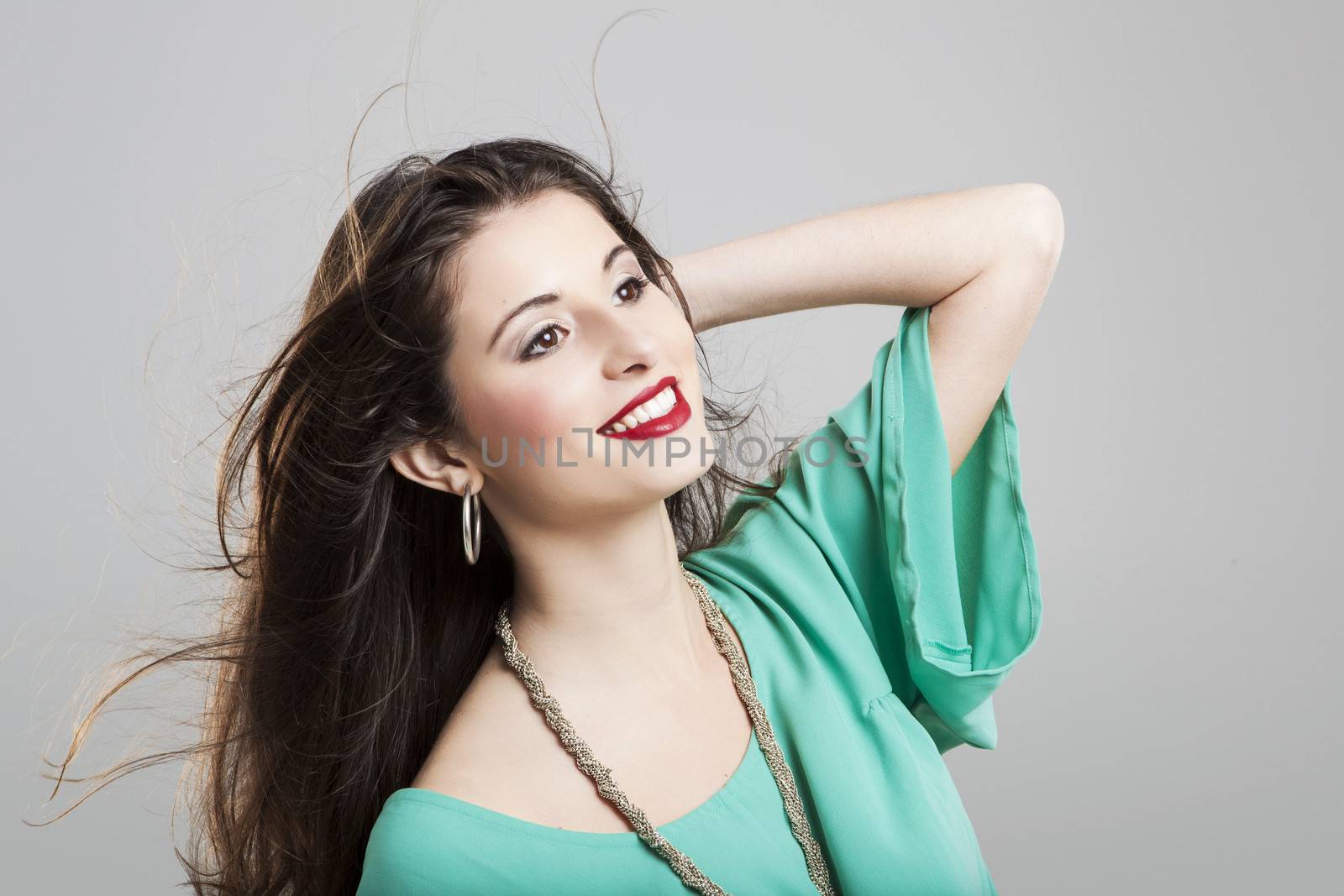 Studio portrait of a beautiful and atractive fashion woman posing