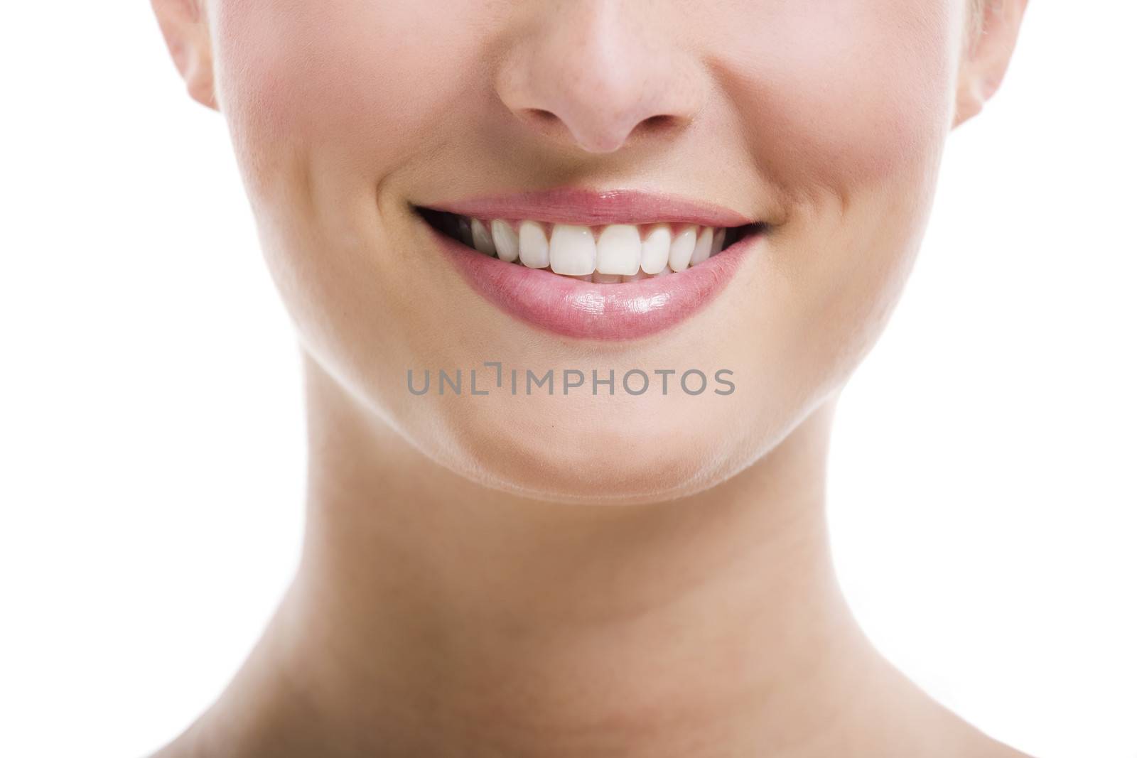 Young woman with a big and beautiful smile, isolated over a white background