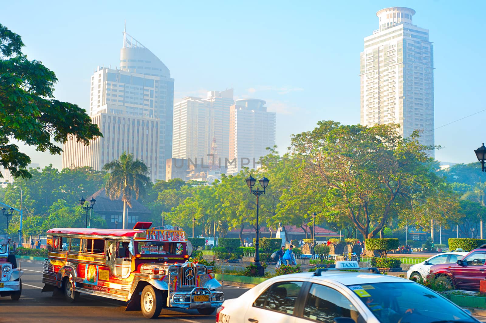 MANILA - APRIL 01, 2012: Morning traffic on the street in Manila, Philippines. Metro Manila is the most populous area in the Philippines with an estimated population of 16,300,000