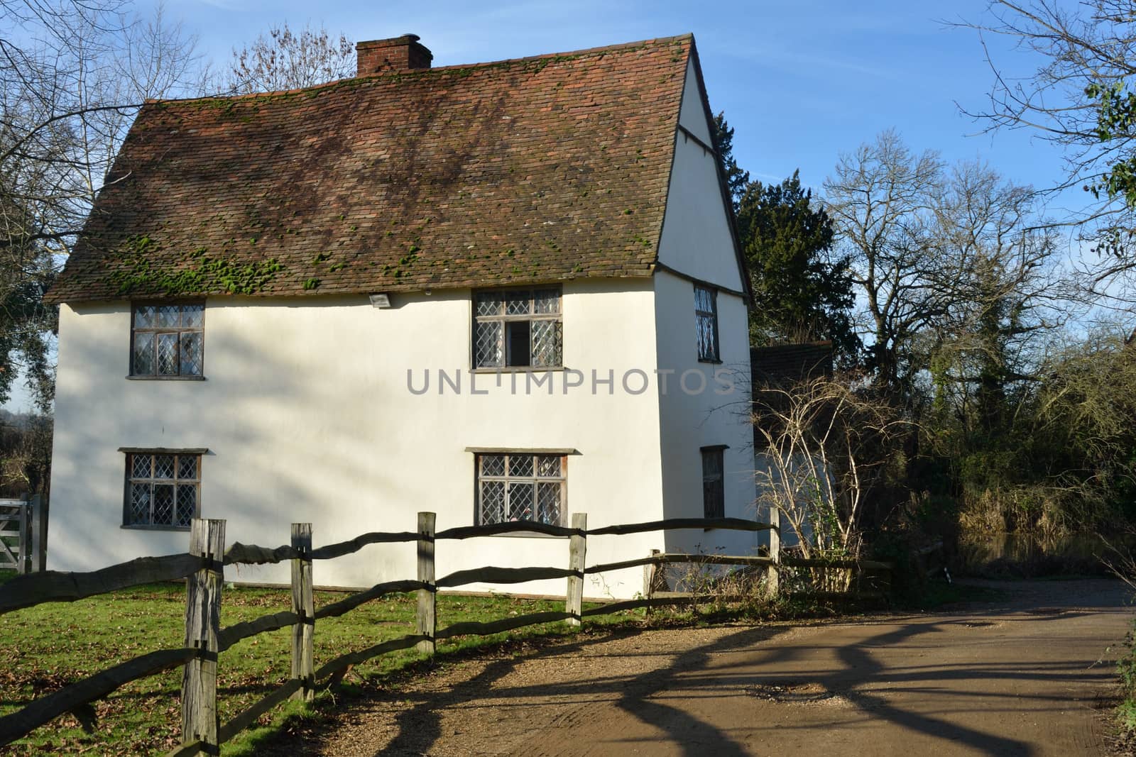 Rear of large white cottage