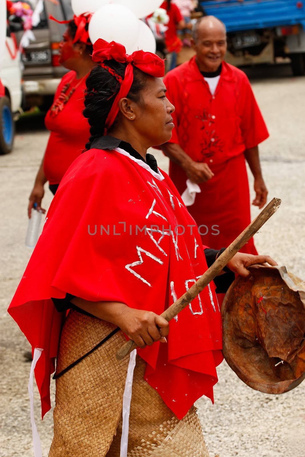 Woman celebrate arriving Fuifui Moimoi on Vavau island, Tonga by donya_nedomam