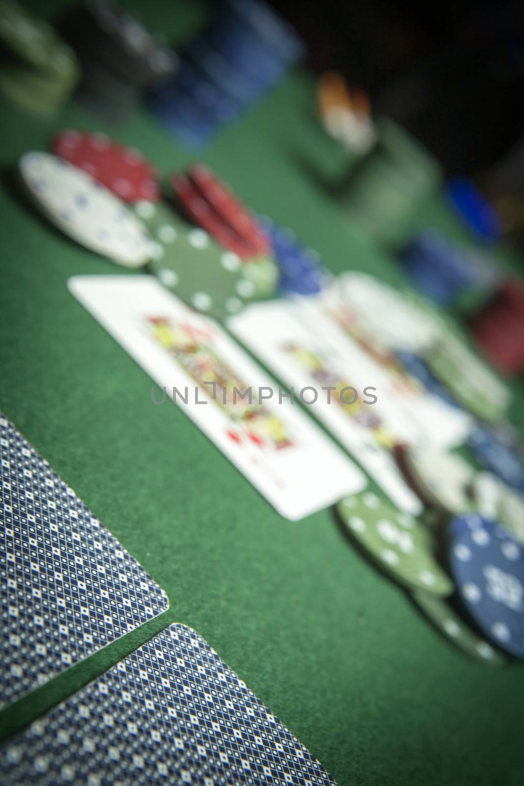 cards poker deck English, poker chips stack on green table 