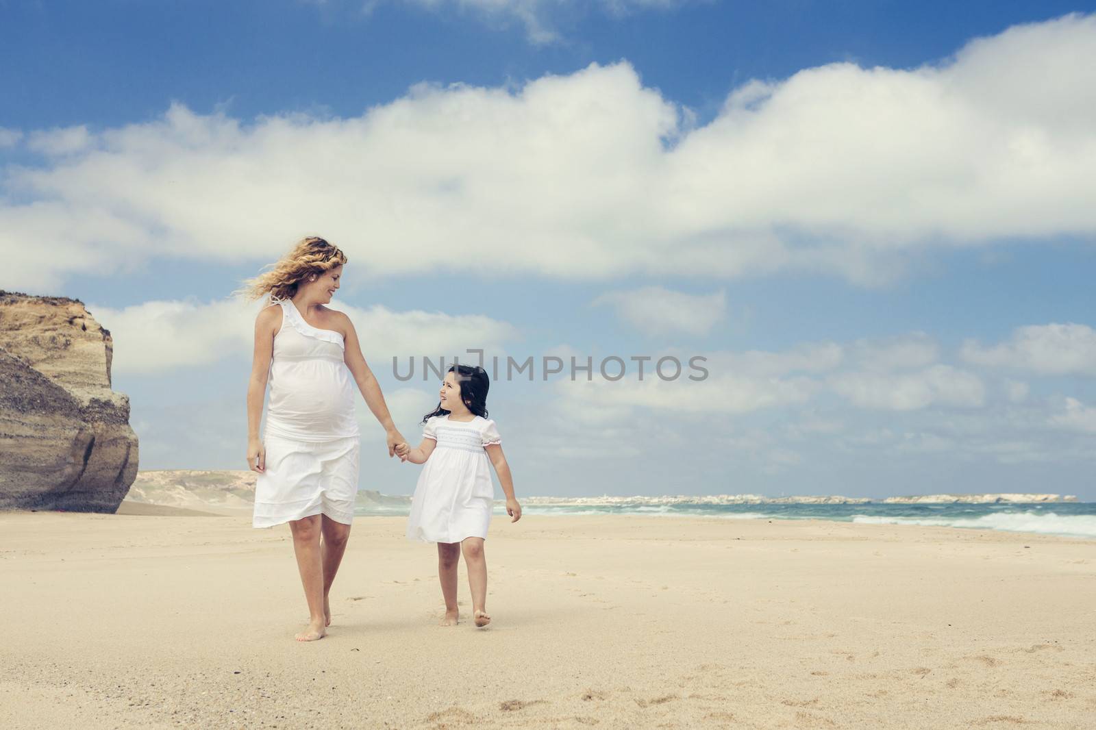 Walking on the beach by Iko