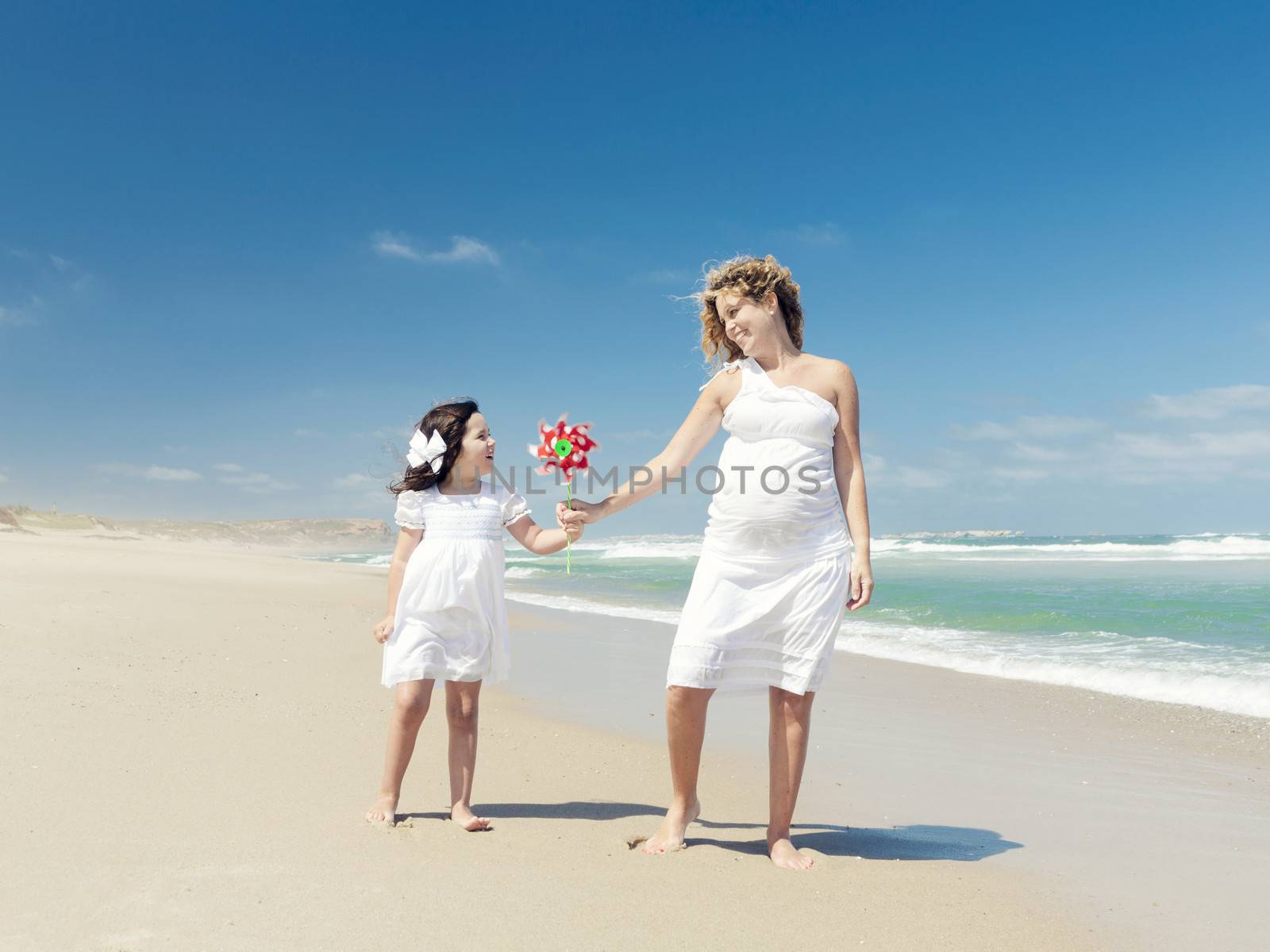 Mother and daughter holding a windmill by Iko