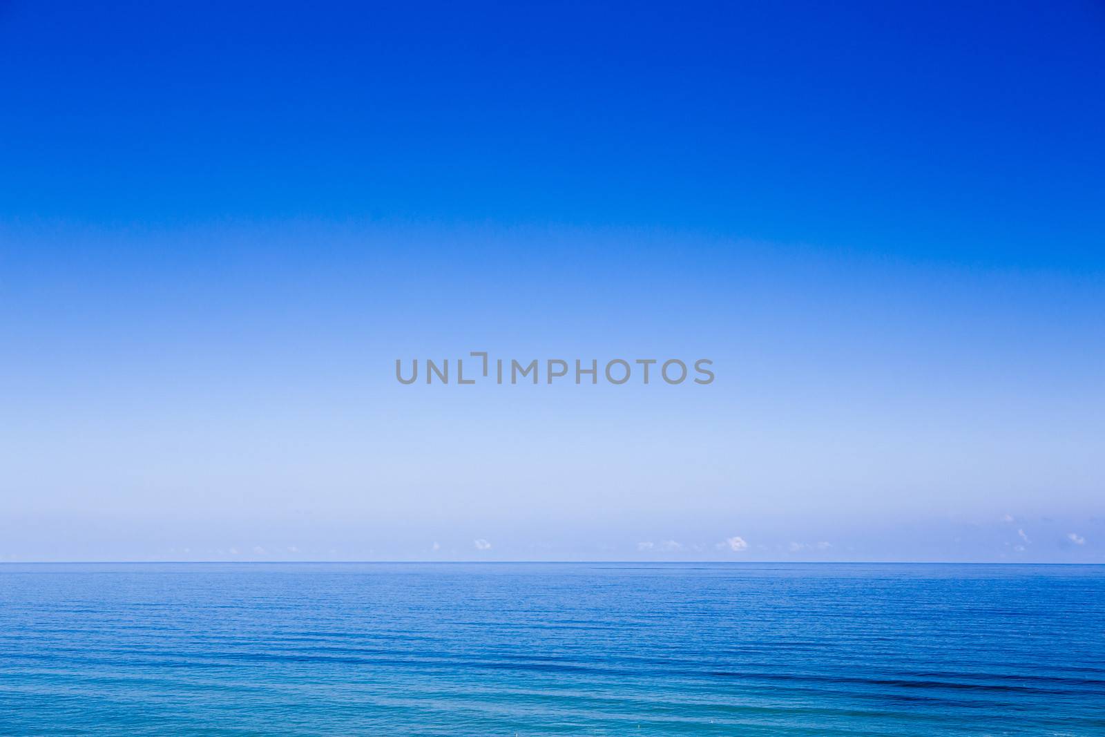 Beautiful landscape picture of a wonderful blue ocean and blue sky