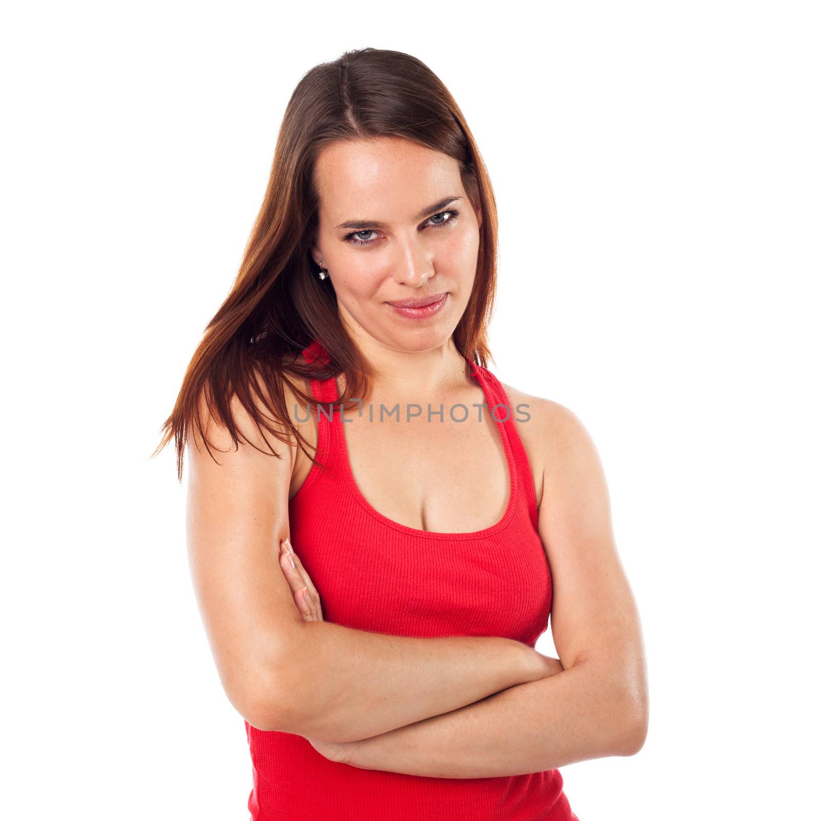 Young brunette with arms crossed looking in front of, isolated on white