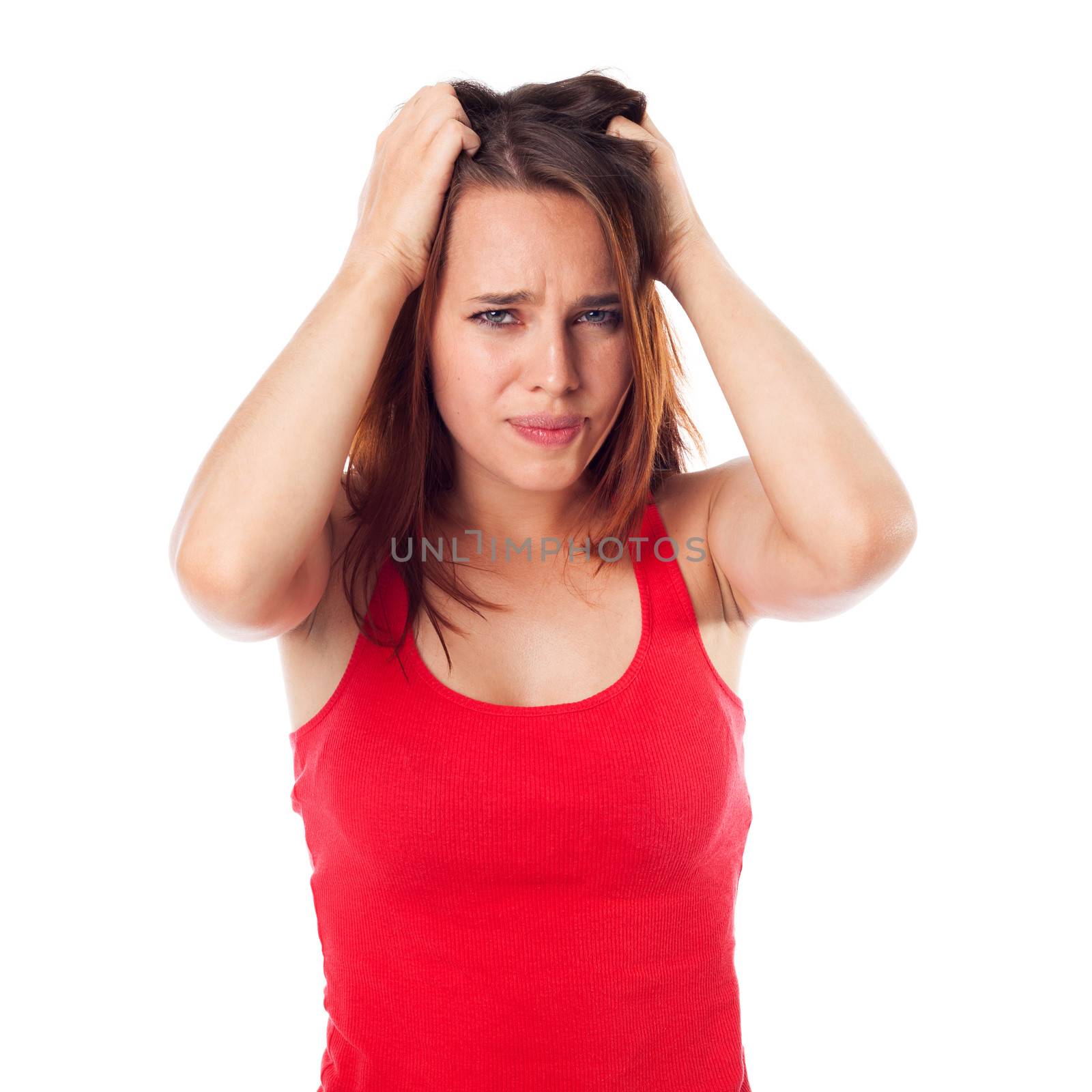 Portrait of a young woman having a negative expression, isolated on white
